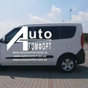 Передний салон,  левое окно на Fiat Doblo 2010