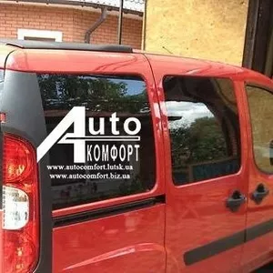 Задний салон,  правое окно,  короткая база на Fiat Doblo 2000