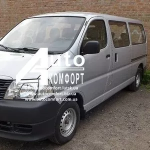 Передний салон,  левое окно на Toyota Hiace