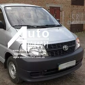 Передний салон,  правое окно на Toyota Hiace 